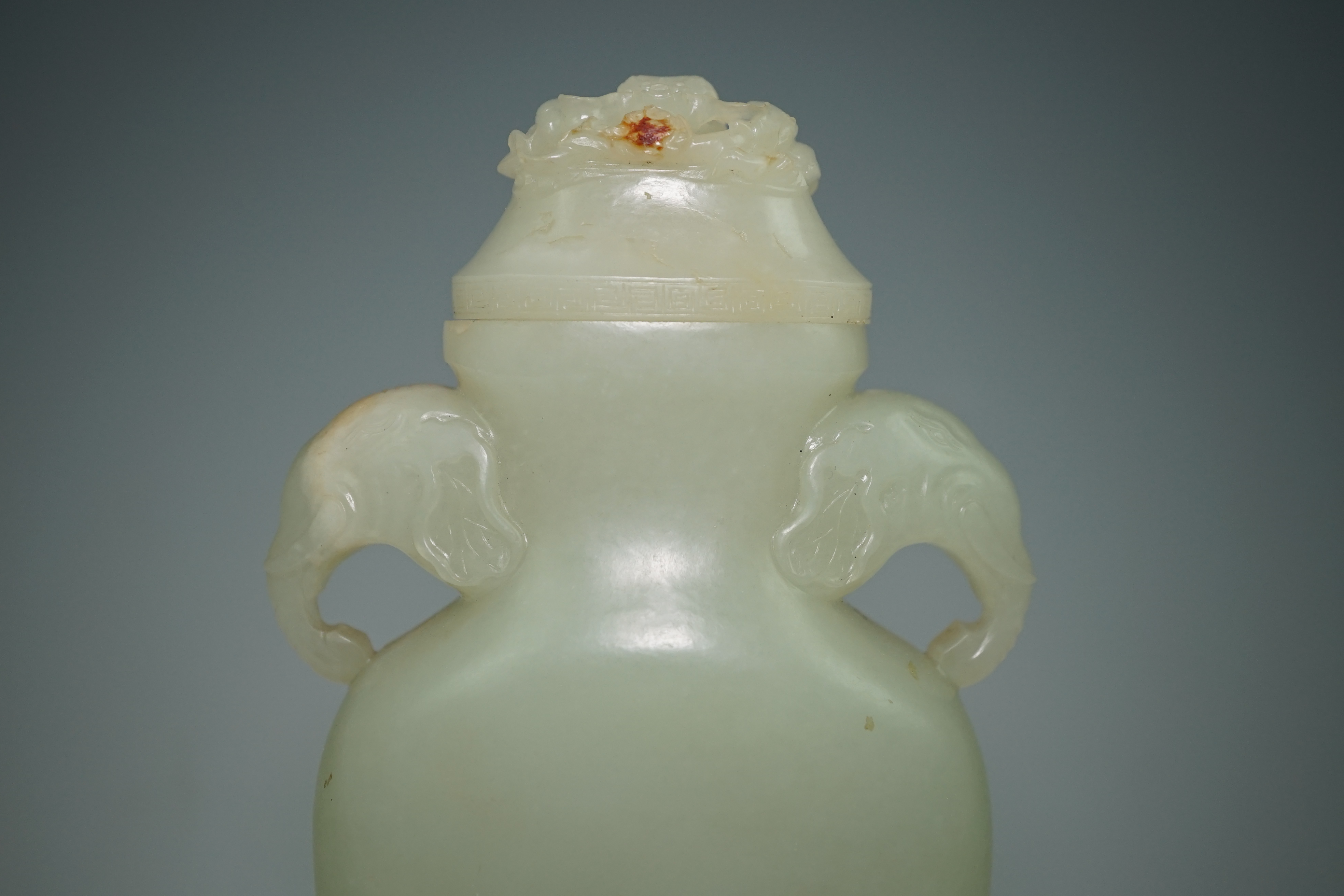 A Chinese pale celadon jade flask-form vase and cover, Qianlong/Jiaqing period, c.1780-1820